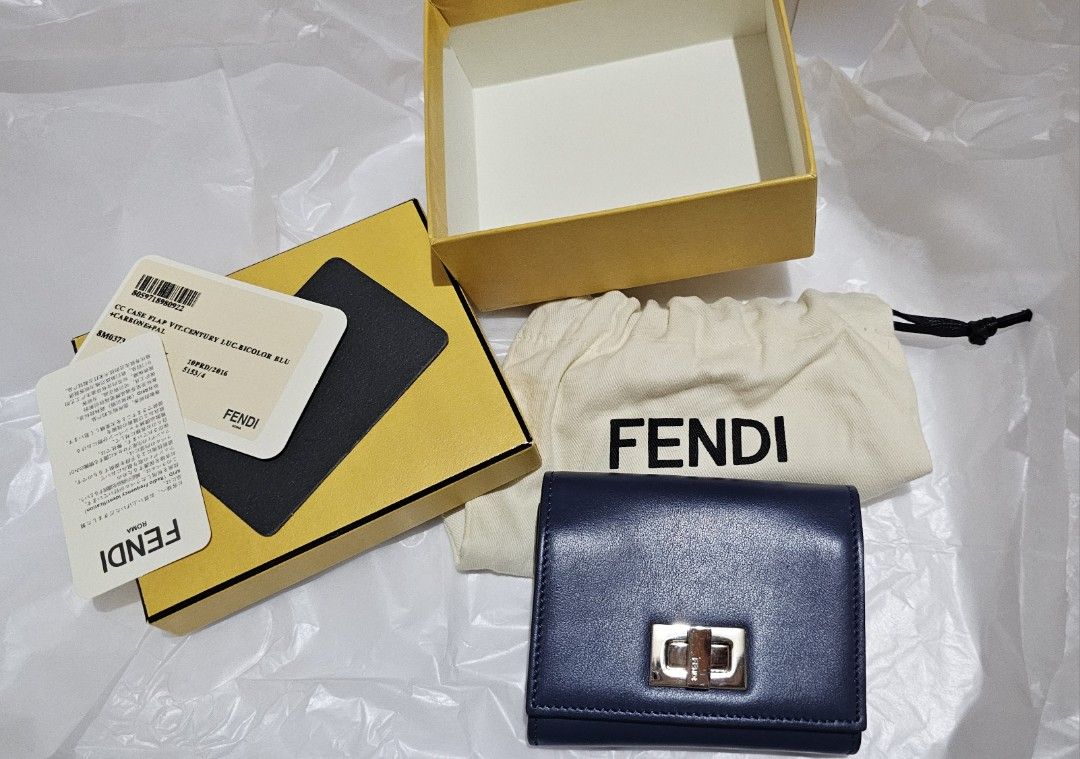 Fendi Card Holder (Category: Luxury Bags & Wallets) located in Manila. Submitted by mermaid819 (Listing ID 1421479694, Image 1). Description: - Authentic Fendi wallet - Navy blue color - Includes original box, dust bag, and tags - like new condition. - complete inclusion.