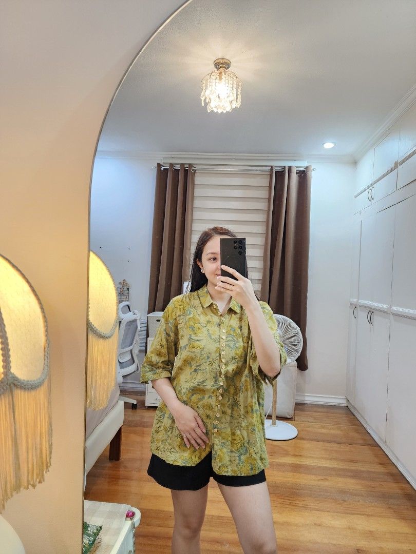 Floral Button-Down Blouse Large (Category: Blouses) located in Cagayan de Oro. Submitted by declutter97 (Listing ID 1421505360, Image 1). Description: - Floral print blouse - Button-down style - Collared neckline - Relaxed, slightly oversized fit - Yellow and green color - Used once.