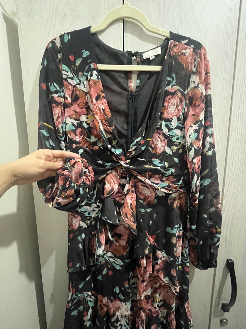 Floral Long Sleeve Dress (Category: Dresses) located in Makati City. Submitted by joycesp (Listing ID 1421509207, Image 3). Description: Elegant long-sleeved dress featuring a beautiful floral pattern. It has a V-neckline with a knot detail at the waist and a tiered ruffle hem. The dress has a keyhole back and a zipper closure..