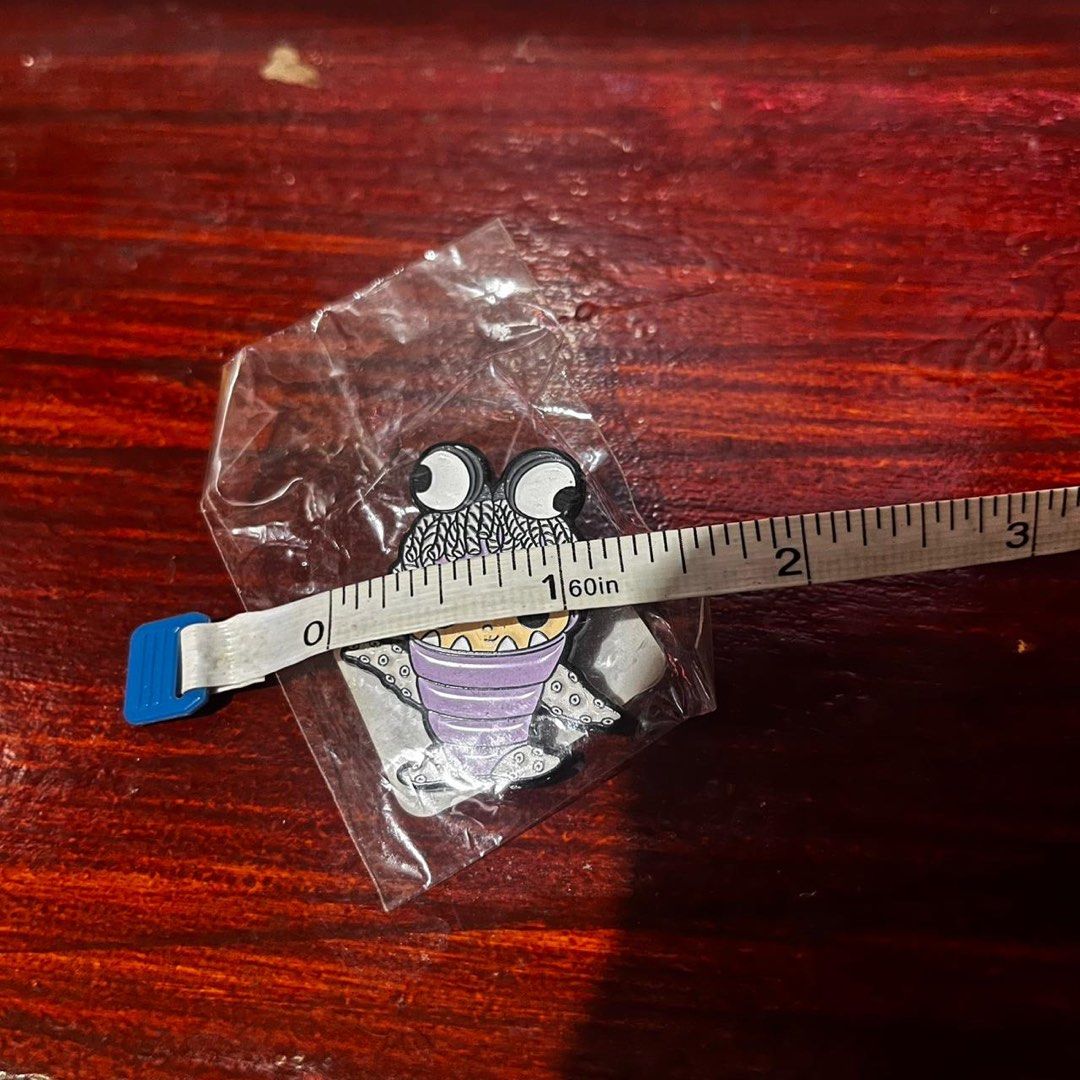 Funko Boo Monsters Inc. Pin [VALENTINES DAY POST] (Category: Designer & Blind Box Toys) located in Del Monte. Submitted by collectandsell_ph (Listing ID 1421472608, Image 2). Description: - Boo pin from Monsters Inc. (monster costume) - Brand new, still in original packaging - Pin size: Approximately 1.5 inches - Features a barcode on the back - Made in China [VALENTINES DAY POST] CAN SEND MORE PHOTOS OR JUMP INTO A QUICK VIDEOCALL BEFORE YOU SEN