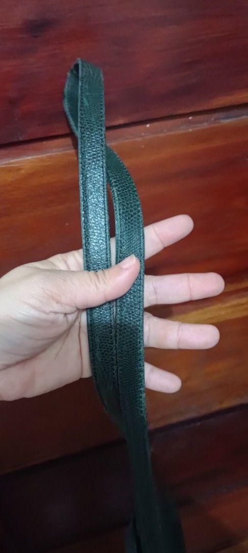 Givenchy Green Crossbody Bag (Category: Luxury Bags & Wallets) located in Quezon City. Submitted by ir0412 (Listing ID 1421567251, Image 3). Description: - Green Givenchy crossbody bag - Flap closure with gold-tone logo - Adjustable long strap - Light brown interior lining - Gold-tone chain detail - Made of a textured material -authentic money-back guarantee.