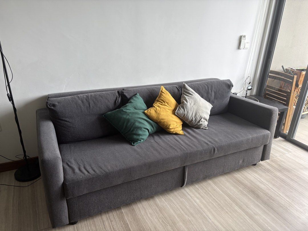 Grey Sofa Bed with Pillows