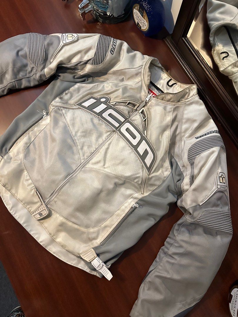 Icon Contra Textile Motorcycle Jacket - XL (Category: Coats, Jackets and Outerwear) located in Quezon City. Submitted by calebkale1 (Listing ID 1421600694, Image 2). Description: Icon Contra motorcycle jacket Padded: back, shoulder and elbow Size: XL L:27 W:24 - Zippered pockets - Adjustable waist straps - Mesh lining - 'Textile Jacket Care' tag.