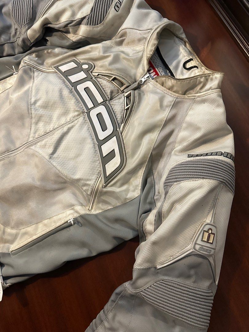 Icon Contra Textile Motorcycle Jacket - XL (Category: Coats, Jackets and Outerwear) located in Quezon City. Submitted by calebkale1 (Listing ID 1421600694, Image 3). Description: Icon Contra motorcycle jacket Padded: back, shoulder and elbow Size: XL L:27 W:24 - Zippered pockets - Adjustable waist straps - Mesh lining - 'Textile Jacket Care' tag.
