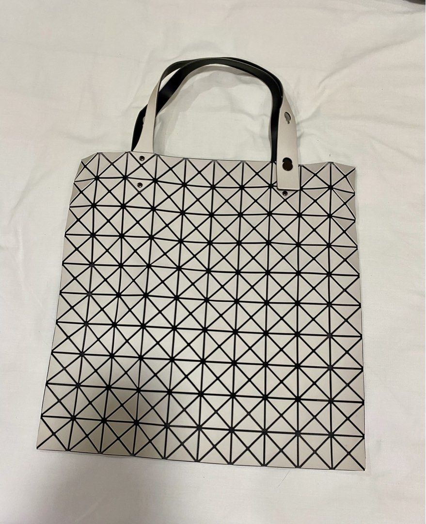 Issey Miyake Bao Bao Tote Bag (Category: Tote Bags) located in Las Pinas. Submitted by mrcps (Listing ID 1421494935, Image 1). Description: Large tote bag Geometric panelled design (matte finish) Open top Guaranteed Authentic Comes with dustbag and tag Never used, no flaws With free bag insert Rfs- decluttering .