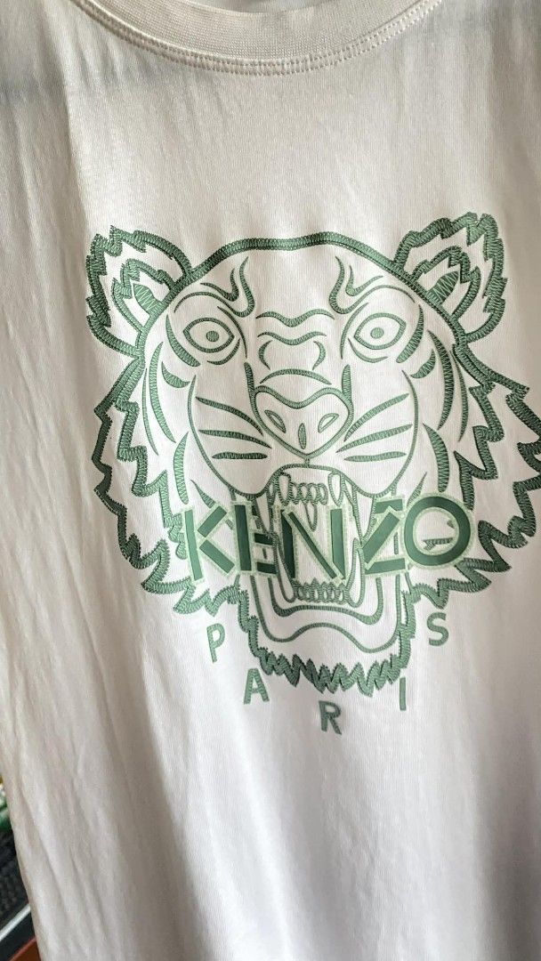Kenzo Tiger T-shirt - White (Category: Others Tops) located in Las Pinas. Submitted by choochiee (Listing ID 1421465022, Image 3). Description: - Original Kenzo - used once - srp ~ 12k - selling for 6k only negotiable - send your offer if interested - location ~ philamlife village Las piñas - pick up ✅ - meet up ✅ ( vista mall Las piñas) - lalamove/Grab ✅ - Lbc / J&t .