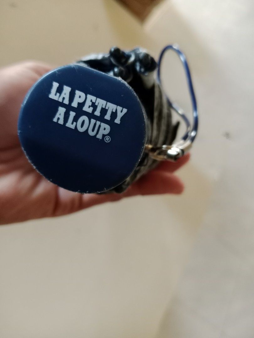 La petty a loup Umbrella (Category: Umbrellas) located in Polangui. Submitted by cornerbags_shoes (Listing ID 1421548514, Image 3). Description: Japan surplus - Navy blue La petty a loup umbrella - Features a cute teddy bear design - Silver interior - Black handle - Folds up compactly - Perfect for rainy days - Stylish and functional - not automatic.