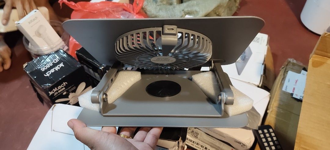 Laptop Cooling Pad with Fan (Category: Laptops & Notebooks) located in Malabon City. Submitted by granmerlencagayandeoro (Listing ID 1421612567, Image 3). Description: - Gray laptop cooling pad - Built-in fan for enhanced cooling - Adjustable stand for comfortable viewing - Mesh surface for optimal airflow - USB cable included.