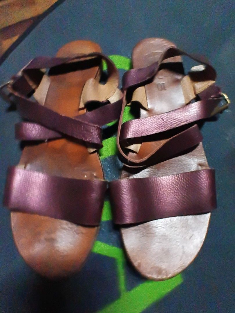 Leather Sandals (Category: Flats & Sandals) located in Manila. Submitted by glamourfashionclothing (Listing ID 1421525683, Image 2). Description: - Deep purple leather sandals - Stylish strap design - Comfortable leather footbed - Secure buckle closure - Flat sole for easy wear - Ideal for casual outings.