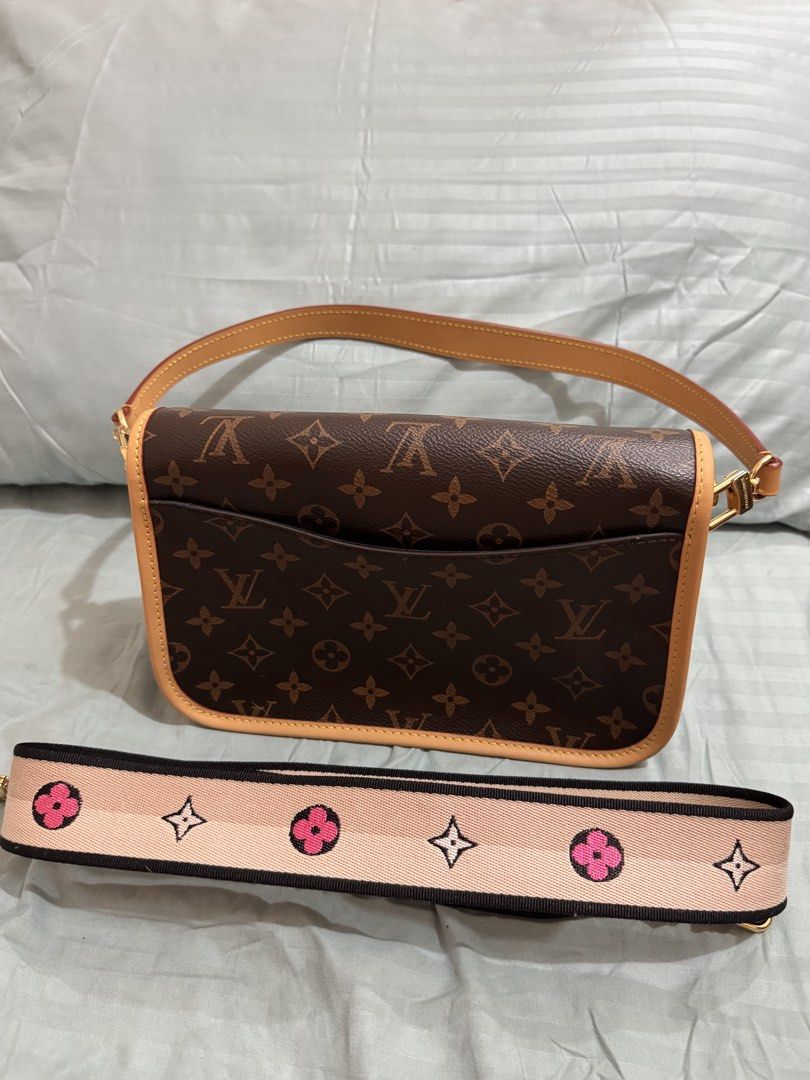 Louis Vuitton Monogram - Diane Shoulder Bag (Category: Luxury Bags & Wallets) located in Quezon City. Submitted by wanderwoman24th (Listing ID 1421543328, Image 2). Description: - Self Authenticate - Pre loved - Iconic Monogram pattern - Detachable strap with Louis Vuitton logo - Flap closure - Classic brown monogram canvas with leather - With long canvas strap.