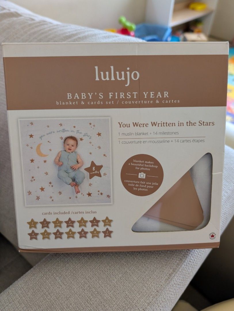 Lulujo Baby's First Year (Category: Babies & Kids Fashion) located in Mandaluyong City. Submitted by kiraboo (Listing ID 1421618693, Image 1). Description: - Lulujo Baby's First Year Set - Includes: - Muslin blanket with 'You Were Written in the Stars' design - 14 milestone cards (1 day to 1 year) - Perfect for capturing baby's first year memories. - as is please check photo.