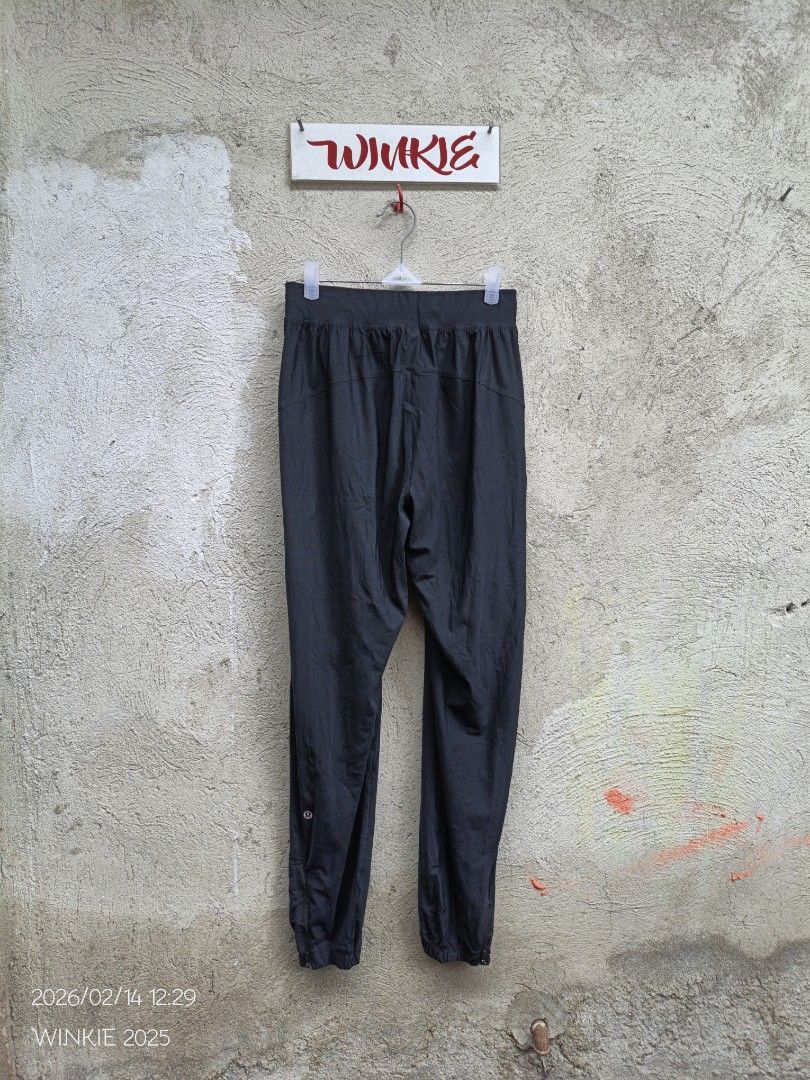 Lululemon Adapted State High-Rise Jogger - Black (Category: Other Bottoms) located in Buenavista. Submitted by lairdmixitems (Listing ID 1421501565, Image 3). Description: - Lululemon Adapted State High-Rise Joggers - Color: Black - Size: 6 - Features: High-rise, zipper pockets - Design: Includes small Lululemon logo - Material: Blend of polyester and lycra - Style: Comfortable fit, suitable for workouts or casual wear.