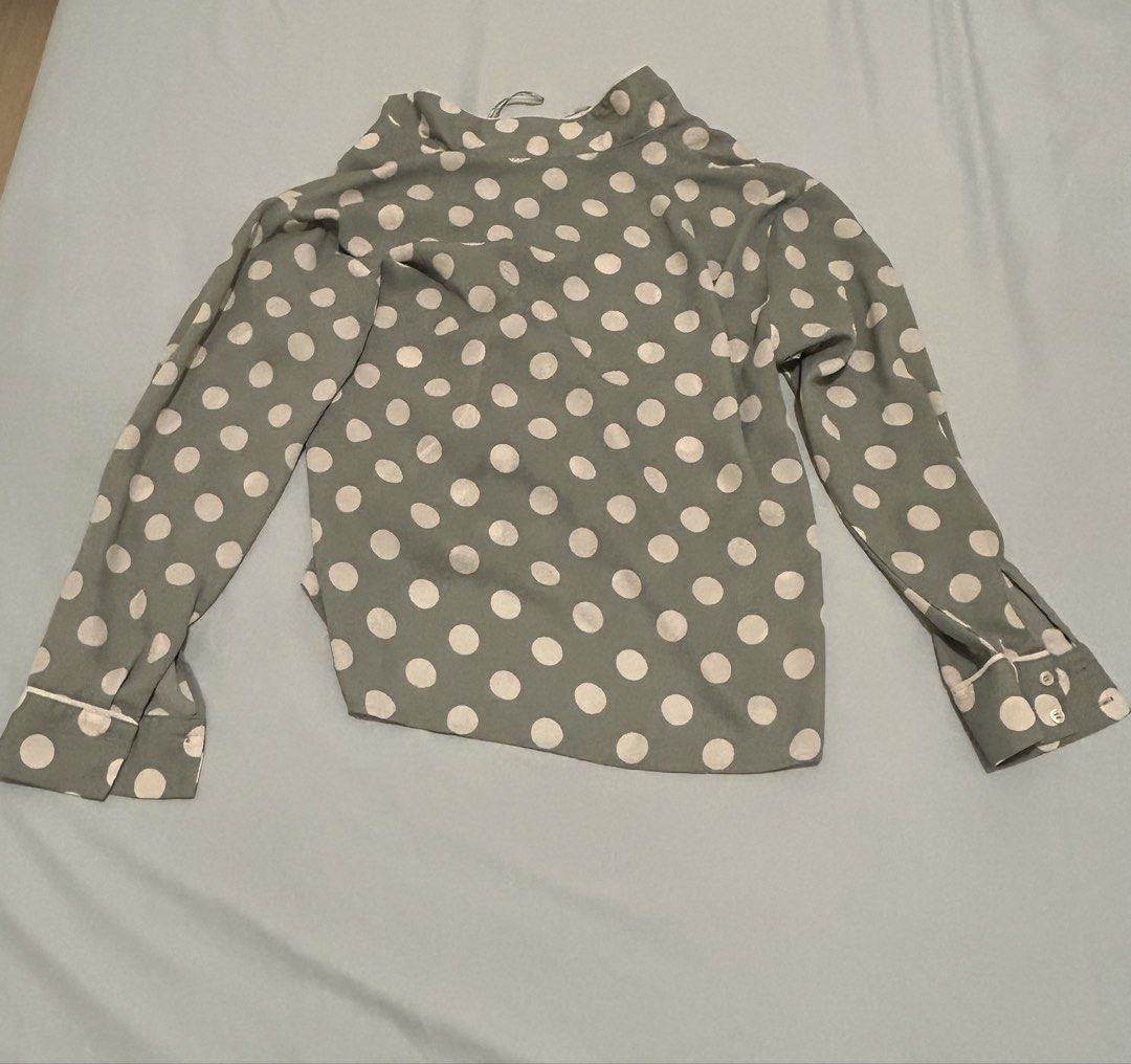 Mango Polka Dot Blouse (Category: Blouses) located in Quezon City. Submitted by bea30 (Listing ID 1421589077, Image 2). Description: - Mango blouse - Polka dot pattern - Soft color palette - Long sleeves - Buttoned cuffs - Collared neckline - Button-down front - Lightweight fabric - No issues, used only once.