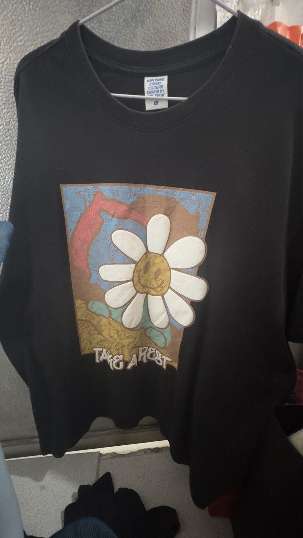 MAUV STUDIO Indie Take A Rest Sweatshirt (Category: Longsleeves) located in Padre Garcia. Submitted by dripden_ph (Listing ID 1421520297, Image 1). Description: - MAUV STUDIO black sweatshirt - Features a daisy graphic with the words "TAKE A REST" - Made of 100% cotton - Size: Large - Design: New Wave Street Culture by Inflation.