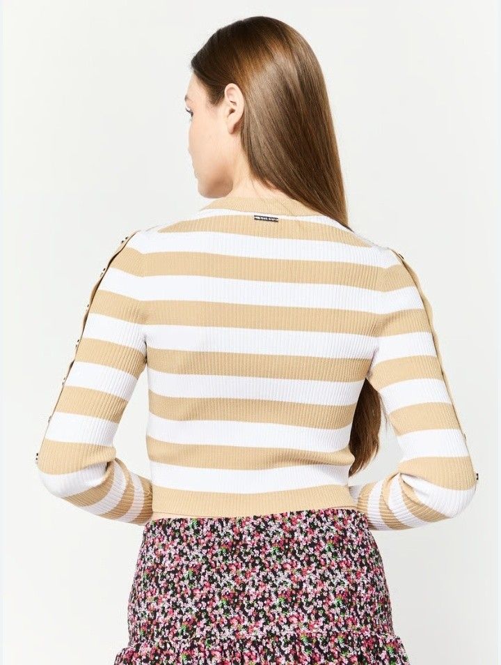 Sale‼️ Michael Kors (Category: Luxury Apparel) located in Cabanatuan. Submitted by miss.maia (Listing ID 1421611379, Image 3). Description: - Michael Kors sweater - Classic striped design - Crew neck - Cropped fit - Neutral color palette (white and tan) - Button details on sleeves - Original price: $356 -selling low for only 8k or offer your price😊.