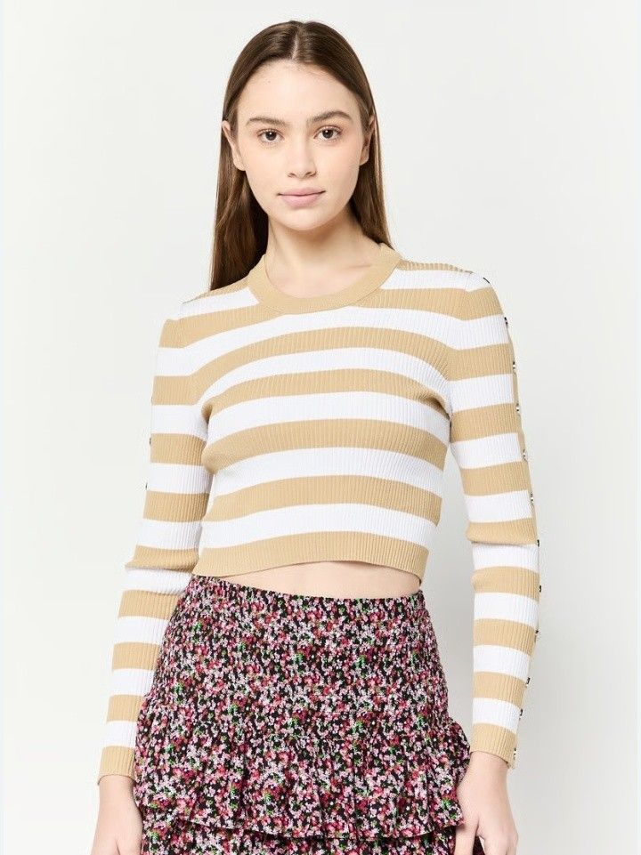 Sale‼️ Michael Kors (Category: Luxury Apparel) located in Cabanatuan. Submitted by miss.maia (Listing ID 1421611379, Image 2). Description: - Michael Kors sweater - Classic striped design - Crew neck - Cropped fit - Neutral color palette (white and tan) - Button details on sleeves - Original price: $356 -selling low for only 8k or offer your price😊.