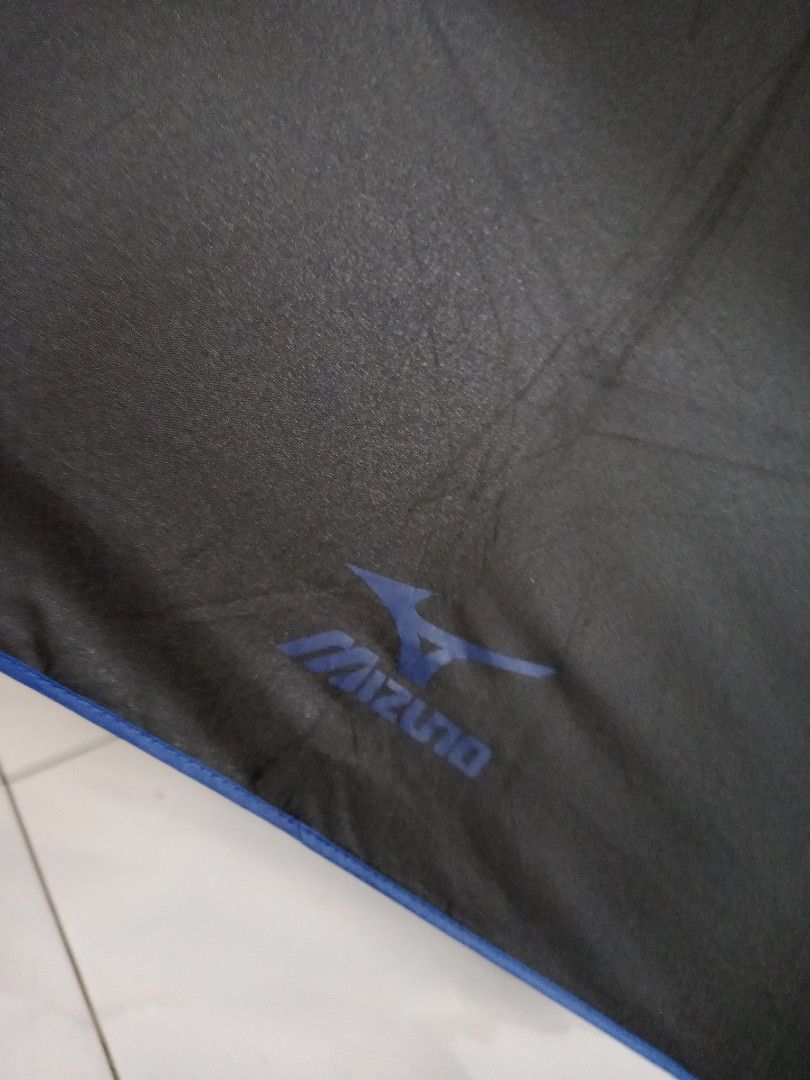 Mizuno Black Umbrella (Category: Umbrellas) located in Polangui. Submitted by cornerbags_shoes (Listing ID 1421548209, Image 2). Description: Japan surplus - Black Mizuno umbrella - Features blue trim - Mizuno logo visible - Compact folding design - Silver handle - Made in China.