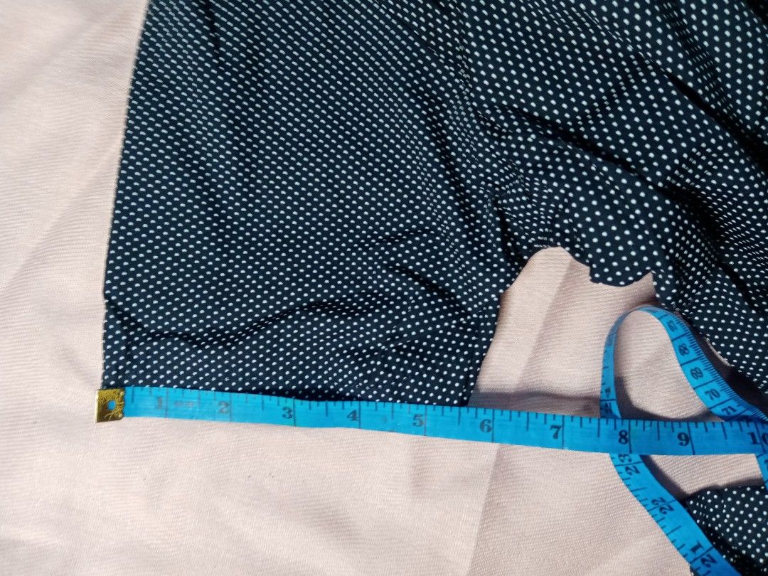 Navy Polka Dot Pants (Category: Other Bottoms) located in Makati City. Submitted by comoro (Listing ID 1421478272, Image 2). Description: - Navy pants with white polka dots - Straight leg cut - Waist: 15 inches - Inseam: 34 inches - Lightweight fabric.