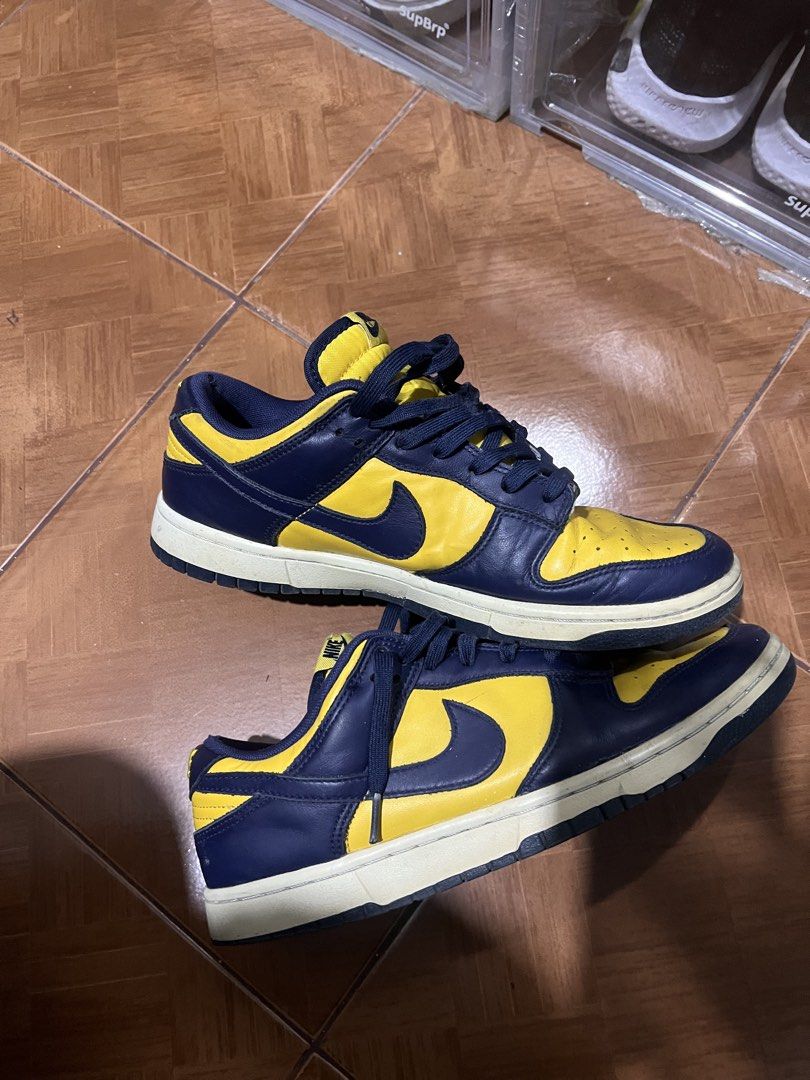 Nike Dunk Low Navy Yellow michigan (Category: Sneakers) located in Manila. Submitted by rarerabbit-fd070e (Listing ID 1421466520, Image 2). Description: - Nike Dunk Low - Navy and yellow colorway - Leather upper - Yellow base with navy overlays - Nike swoosh on sides - White midsole - Navy outsole - Includes original laces.