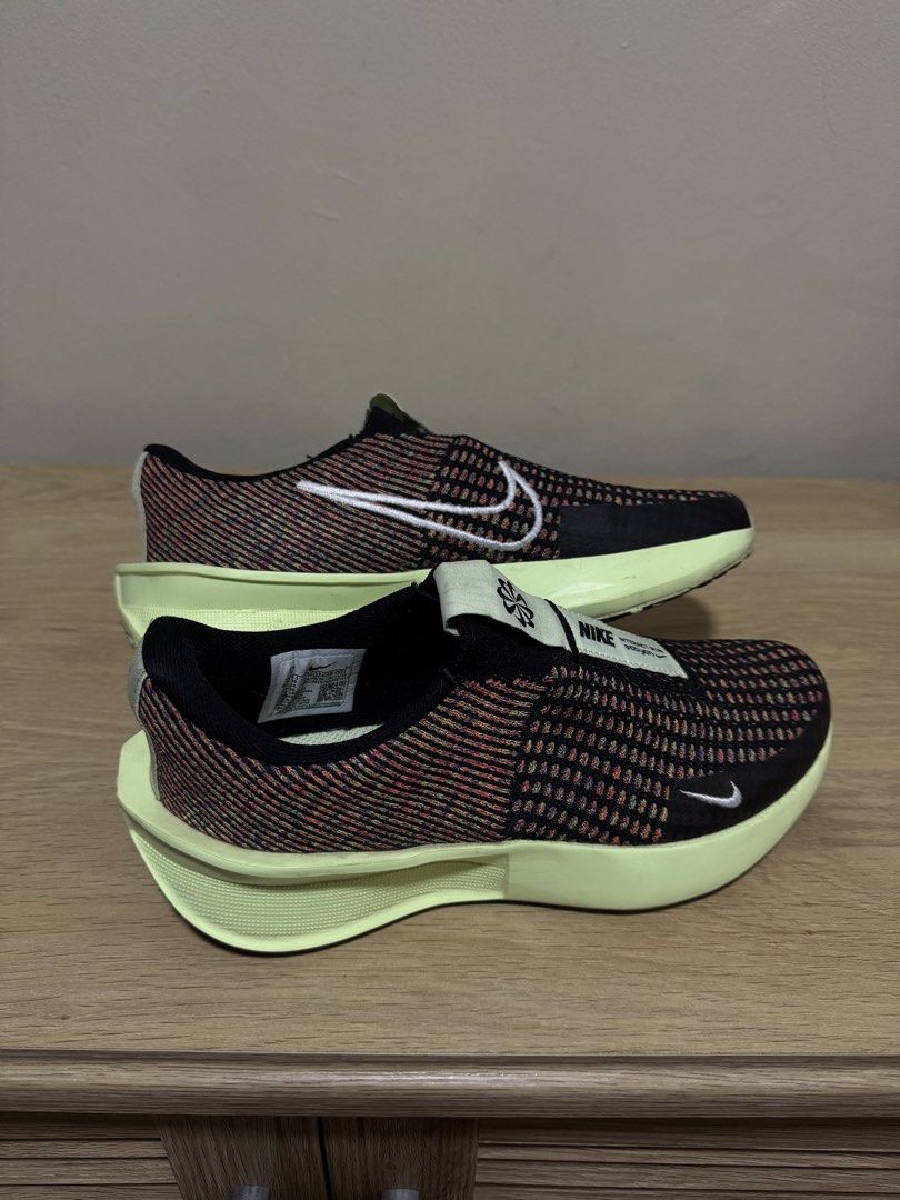 Nike Interact Run EasyOn Sneakers (Category: Sneakers) located in Subic. Submitted by cherrylaym (Listing ID 1421524899, Image 3). Description: Nike Interact Run EasyOn sneakers. Features a black, red, and yellow color scheme. The size is US 7, EUR 38, CM 25. No Box, bought overseas. .