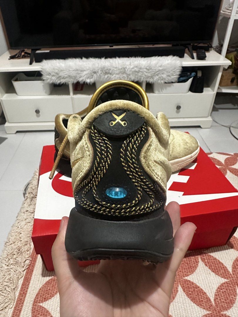 Nike LeBron 21 the X shop (Category: Sneakers) located in Pateros City. Submitted by cosmicearth.743bc2 (Listing ID 1421467177, Image 3). Description: - Gold Nike LeBron 21 x the X shop -size 8 US -honestly used 3-5x -bought from nike fort SRP 12k -replacement box nalang. Natapon na ni misis ang box -almost new. Di na talaga nagagamit. Naka tambak lang - Velvet-like upper -unli legit check all you want -no issue naman .