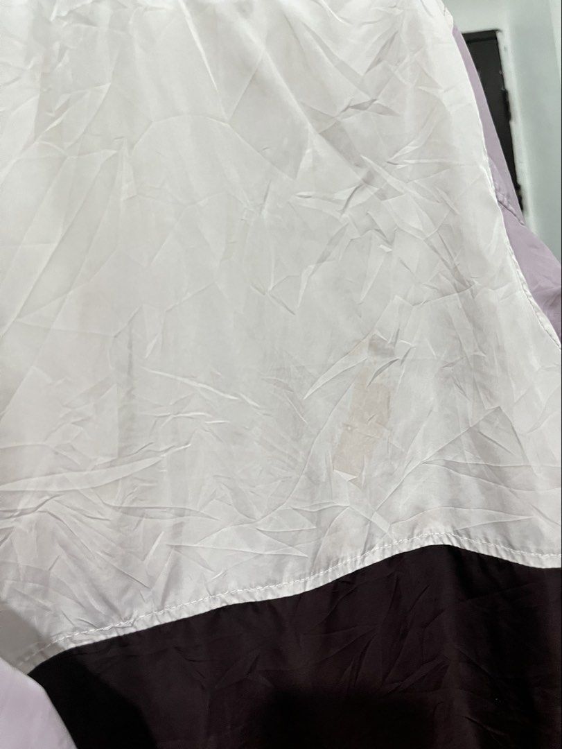 Old Navy Active Jacket (Medium) (Category: Coats, Jackets and Outerwear) located in Manila. Submitted by stuffbyrdj (Listing ID 1421599007, Image 3). Description: - Old Navy Active jacket - Color: White, light purple, and orange - Full zip closure - Mesh lining - Includes matching drawstring bag - Condition: Slightly visible stain.