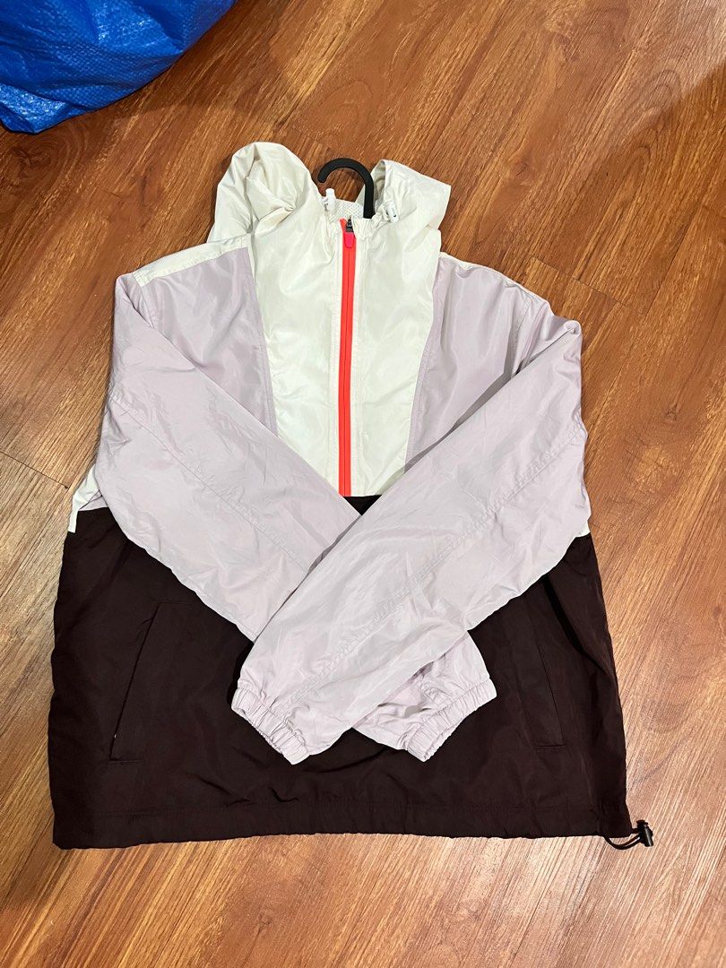 Old Navy Active Jacket (Medium) (Category: Coats, Jackets and Outerwear) located in Manila. Submitted by stuffbyrdj (Listing ID 1421599007, Image 2). Description: - Old Navy Active jacket - Color: White, light purple, and orange - Full zip closure - Mesh lining - Includes matching drawstring bag - Condition: Slightly visible stain.