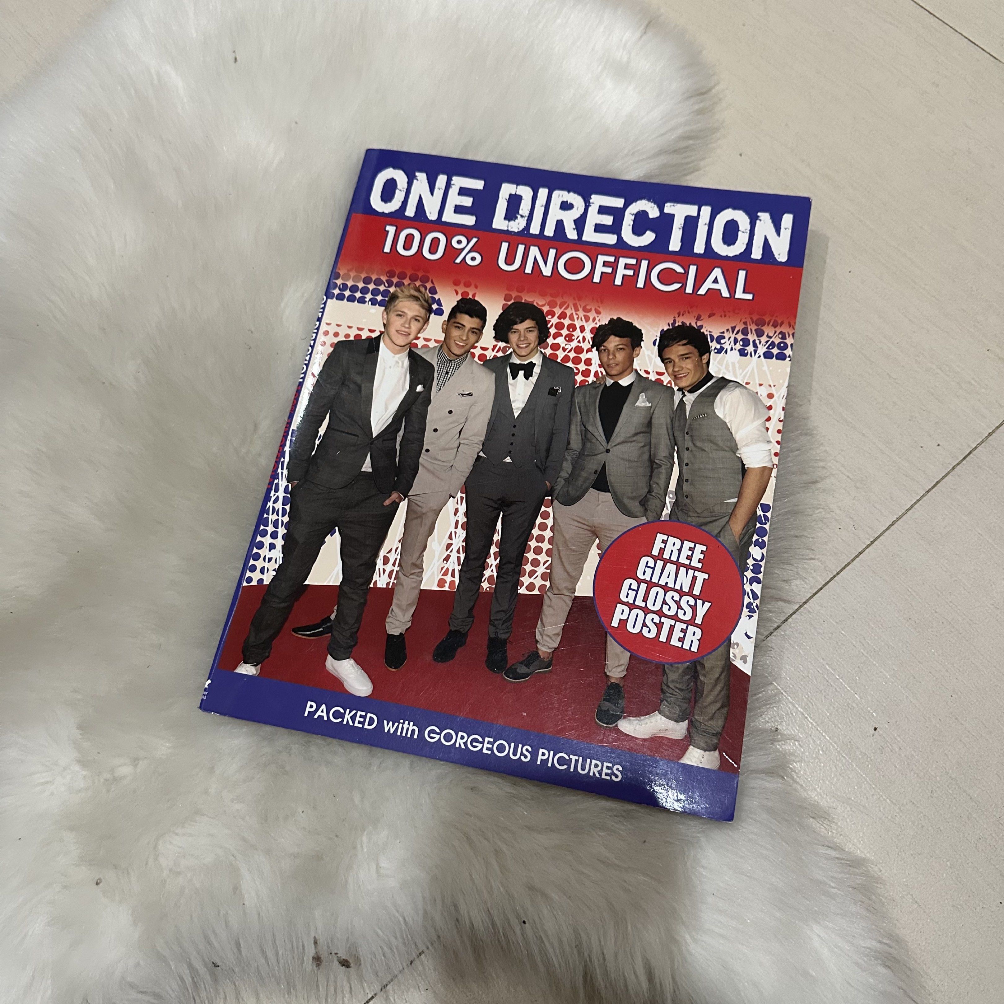 One Direction 100% Unofficial Book (Category: Magazines) located in Cavite. Submitted by fiarteau (Listing ID 1421490985, Image 1). Description: - Features stunning photos of One Direction. - Includes a FREE giant glossy poster. - Showcases all five band members. - Packed with information about the band. - Ideal for any Directioner..