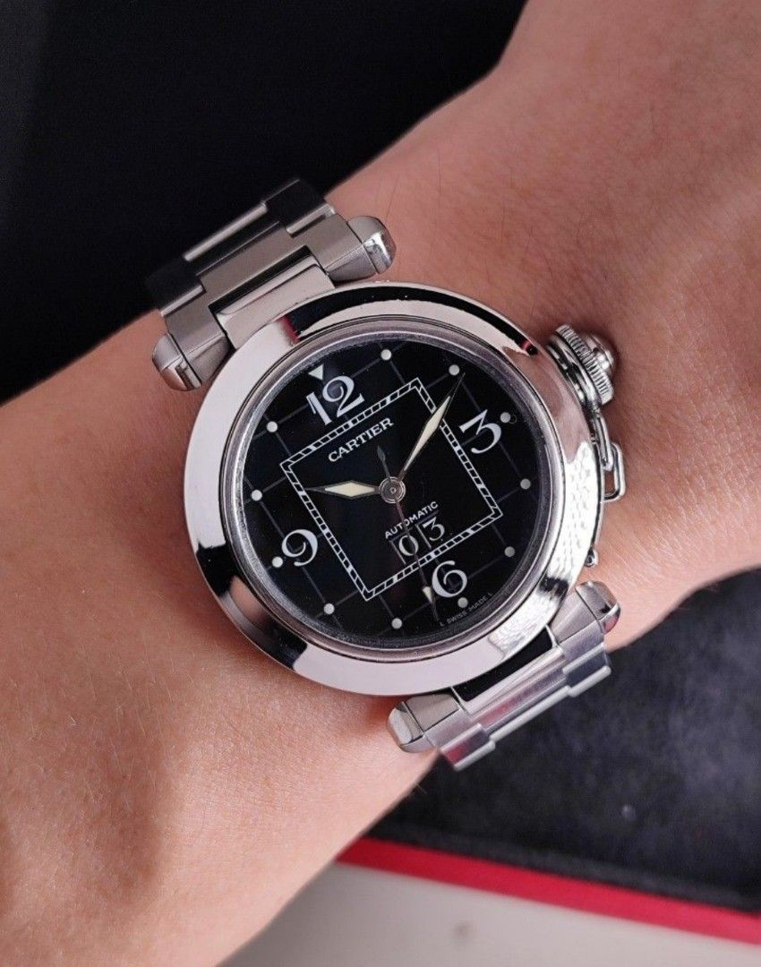 Original Cartier Pasha (Category: Luxury Watches) located in San Juan City. Submitted by exclusivelyours (Listing ID 1421603031, Image 3). Description: Cartier Pasha Big Date 35mm Ref 2475 9/10 condition Inclusions: watch, original bracelet fit to approx 7.3" wrist, Cartier guarantee certificate and watch case *watch is verified on Cartier Care *photo reference on 6.5" wrist.