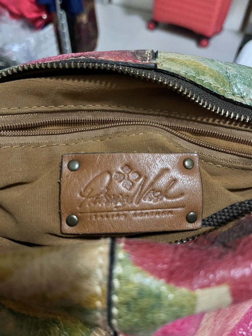 Patricia Nash Floral Handbag (Category: Luxury Bags & Wallets) located in Quezon City. Submitted by nrs_amcandelaria (Listing ID 1421540436, Image 3). Description: - Patricia Nash handbag with floral design - Brown leather strap - Detachable shoulder strap - Front pocket with emblem - Brand label inside - last photo shows brand price in the market.