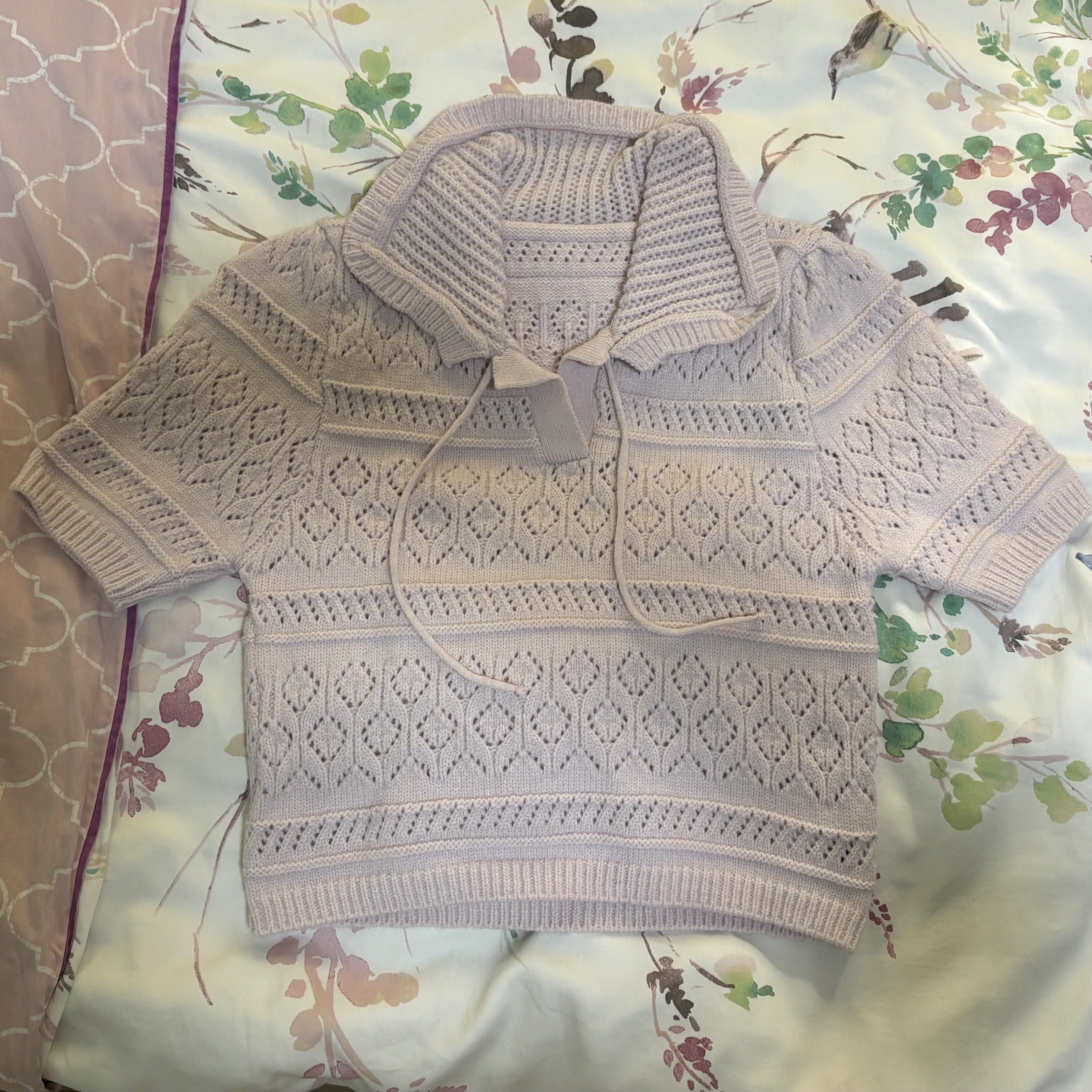 Pink knit shirt (Category: Blouses) located in Quezon City. Submitted by celRis (Listing ID 1421520917, Image 1). Description: - Pink knit shirt - worn once - Thick material - you have to wear something underneath as the design is meant to have “holes”.