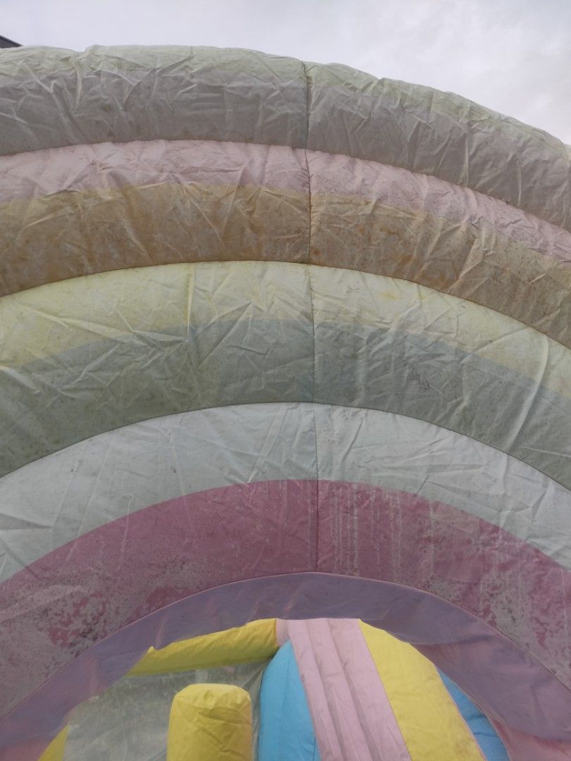 Rainbow Inflatable Bouncer with Slide (Category: Infant Playtime) located in Manila. Submitted by prettyme101395 (Listing ID 1421595372, Image 3). Description: Used once nung bday lng ng anak ko kaso nag ka molds nung tinabi namin paparent sana namin kso nag kron ng molds then nagamitan ng matapang na Molds remover kya nag fade ung rainbow lng nmn na design WALANG BUTAS O ANY DAMAGE MAKAPAL ITO ONCE LNG NAGAMIT THIS IS PVC MATERIAL NOT OXFORD NA 