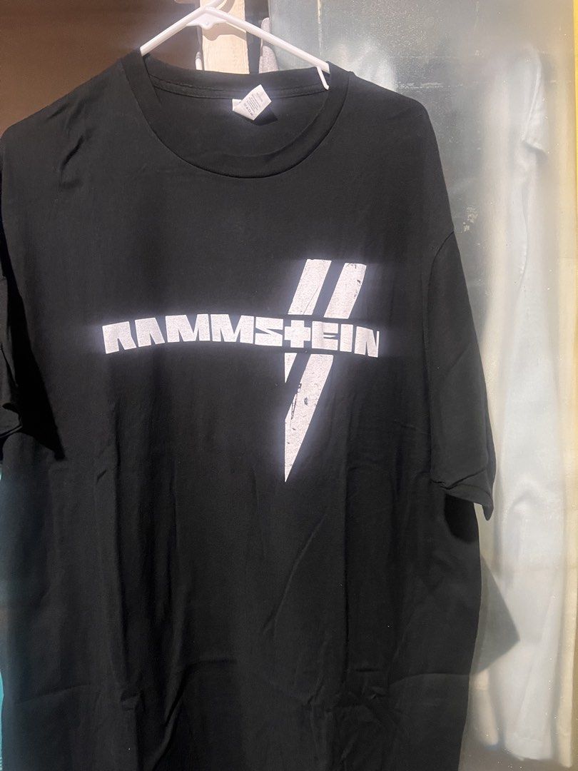 Rammstein Band T-Shirt (Category: Tshirts & Polo Shirts ) located in Manila. Submitted by rarerabbit-fd070e (Listing ID 1421467178, Image 2). Description: - Rammstein band t-shirt - Features band logo on front - Design on the back - Unworn condition - Soft, comfortable material - Perfect for Rammstein fans.