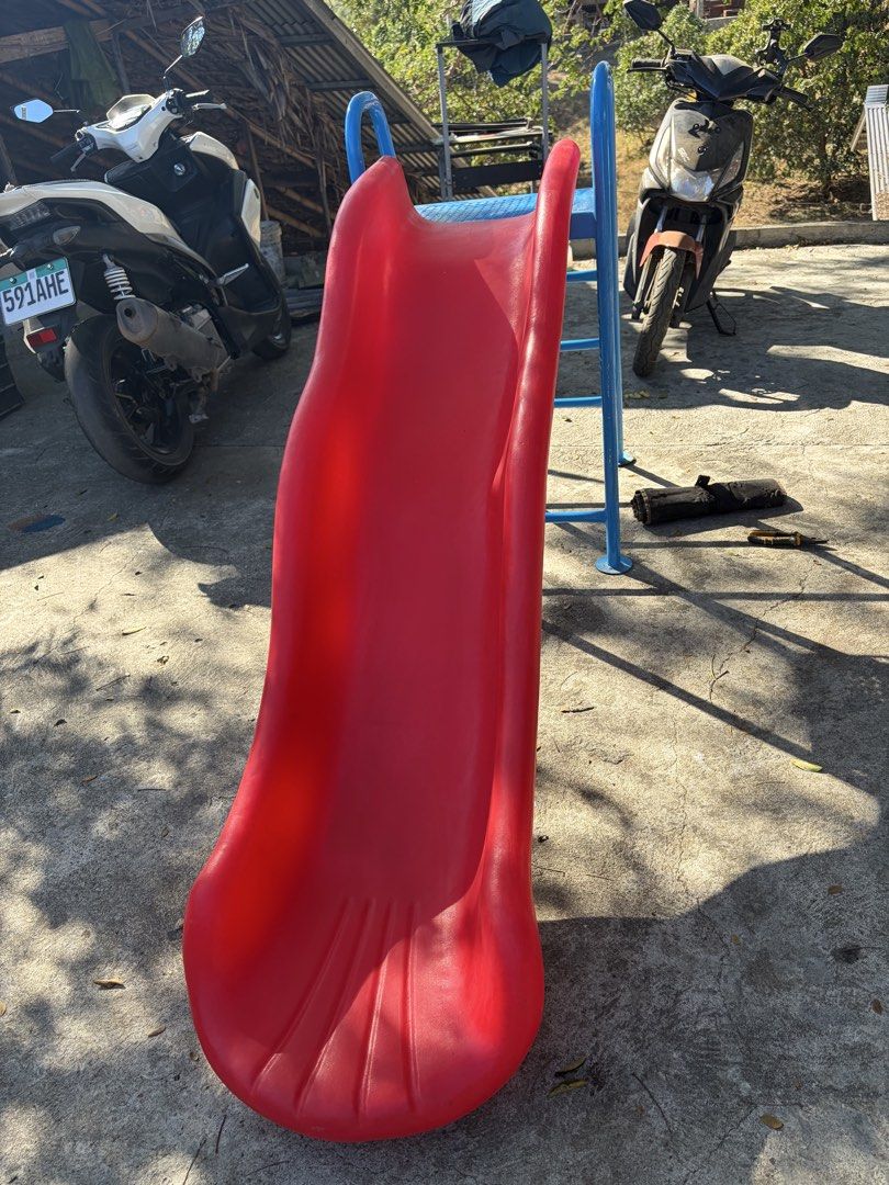 Red and Blue Playground Slide (Category: Infant Playtime) located in Batac City. Submitted by vanillabuttercream (Listing ID 1421457358, Image 2). Description: ✅ Height: 4ft metal frame ✅ Condition: Excellent / Well-maintained ✅ Features: Durable metal frame + wavy chute for extra speed! ✅ Perfect for: Toddlers and young kids ✅ Availability: 2pcs and ready for pick-up! Can have it assembled upon request. Location: Batac City / Laoag City, Ilocos 