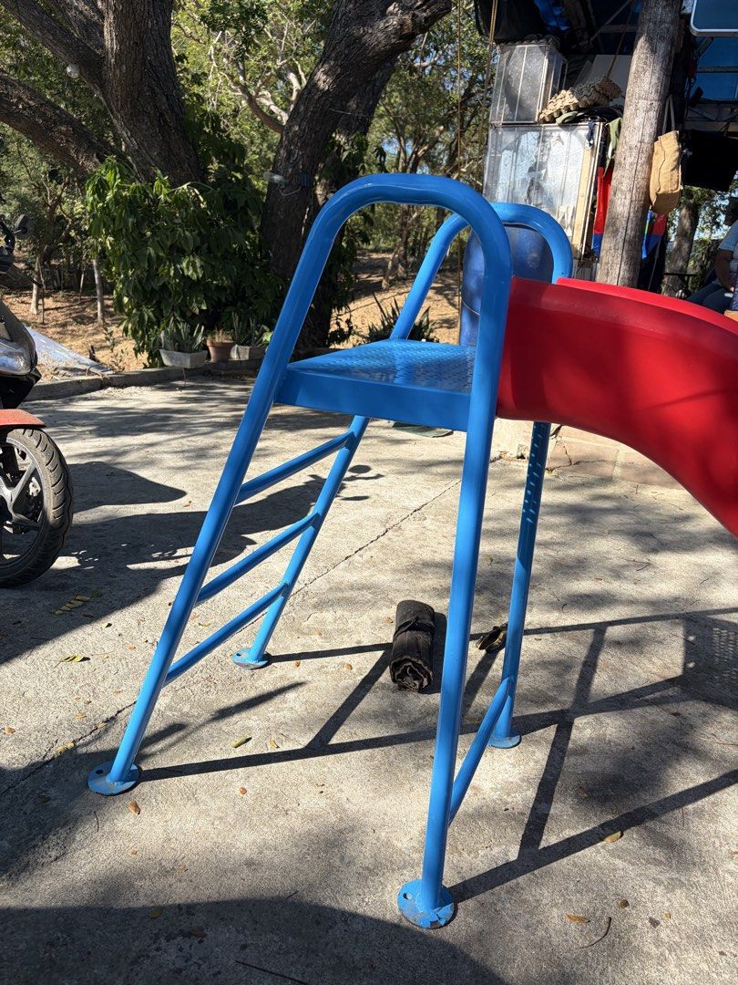 Red and Blue Playground Slide (Category: Infant Playtime) located in Batac City. Submitted by vanillabuttercream (Listing ID 1421457358, Image 3). Description: ✅ Height: 4ft metal frame ✅ Condition: Excellent / Well-maintained ✅ Features: Durable metal frame + wavy chute for extra speed! ✅ Perfect for: Toddlers and young kids ✅ Availability: 2pcs and ready for pick-up! Can have it assembled upon request. Location: Batac City / Laoag City, Ilocos 