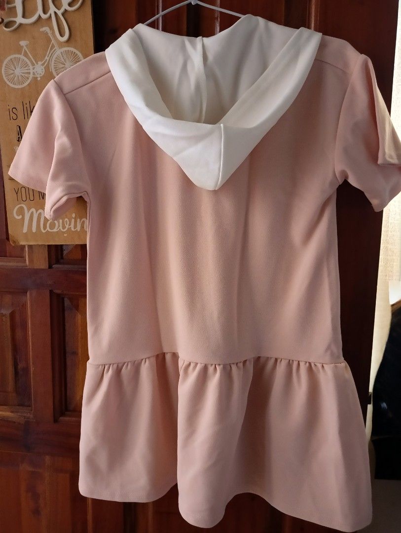 Redtag Dress 7-8 (Category: Babies & Kids Fashion) located in Santa Rosa. Submitted by amiraamara (Listing ID 1421524688, Image 3). Description: - Pink dress with a white collar - Features a hood and short sleeves - Adorned with gold buttons - Ruffled hem detail - Size: 7-8 - Perfect for everyday wear.