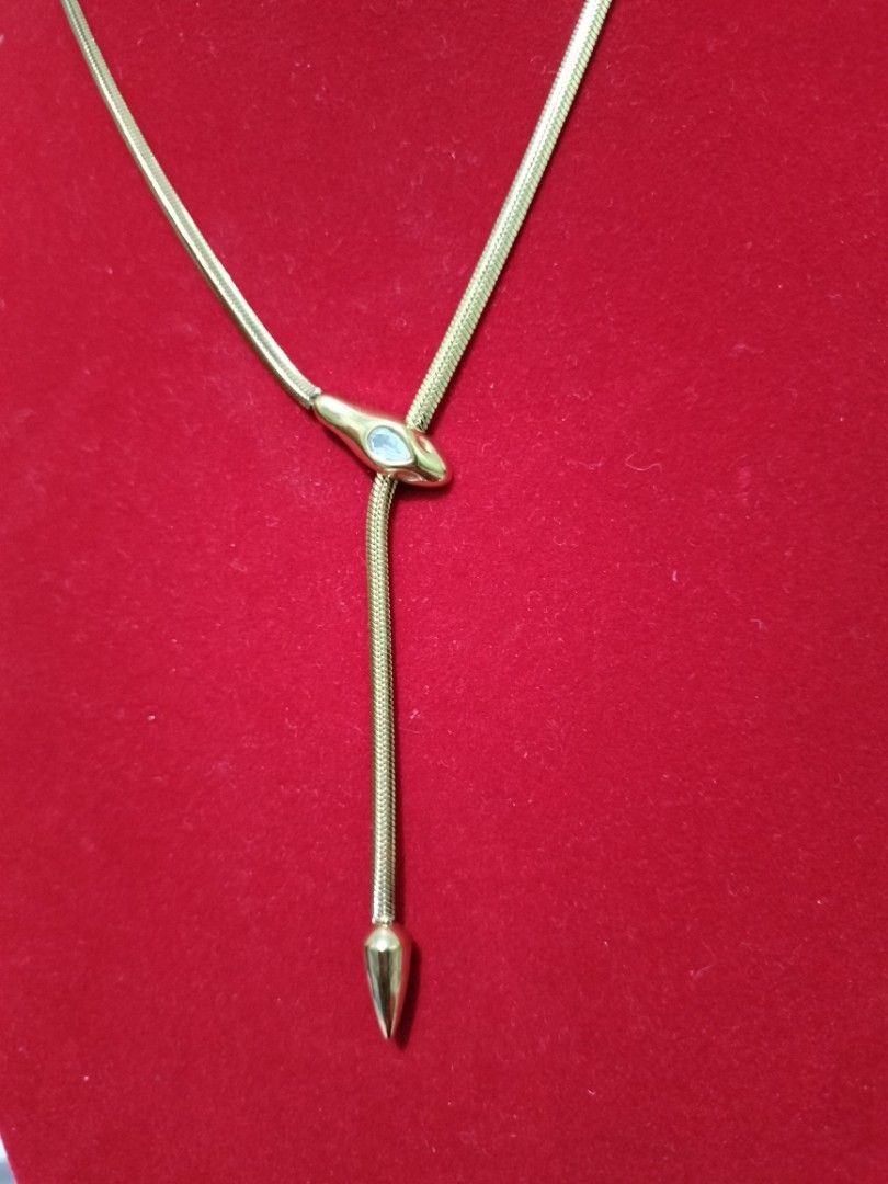 Serpentine Necklace (Category: Necklaces) located in Candelaria. Submitted by jewels_by_mace (Listing ID 1421522679, Image 1). Description: - Gold-tone necklace - stainless steel - hypoallergenic -for everyday use.