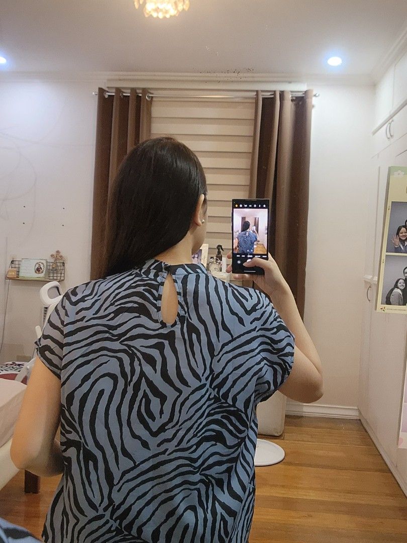 Shein Zebra Print Top - Size S (Category: Blouses) located in Cagayan de Oro. Submitted by declutter97 (Listing ID 1421505456, Image 2). Description: - Shein zebra print top - Size: Small (S) - Design: Round neckline, short sleeves - Detail: Keyhole back - Fabric: Lightweight - Used Once.
