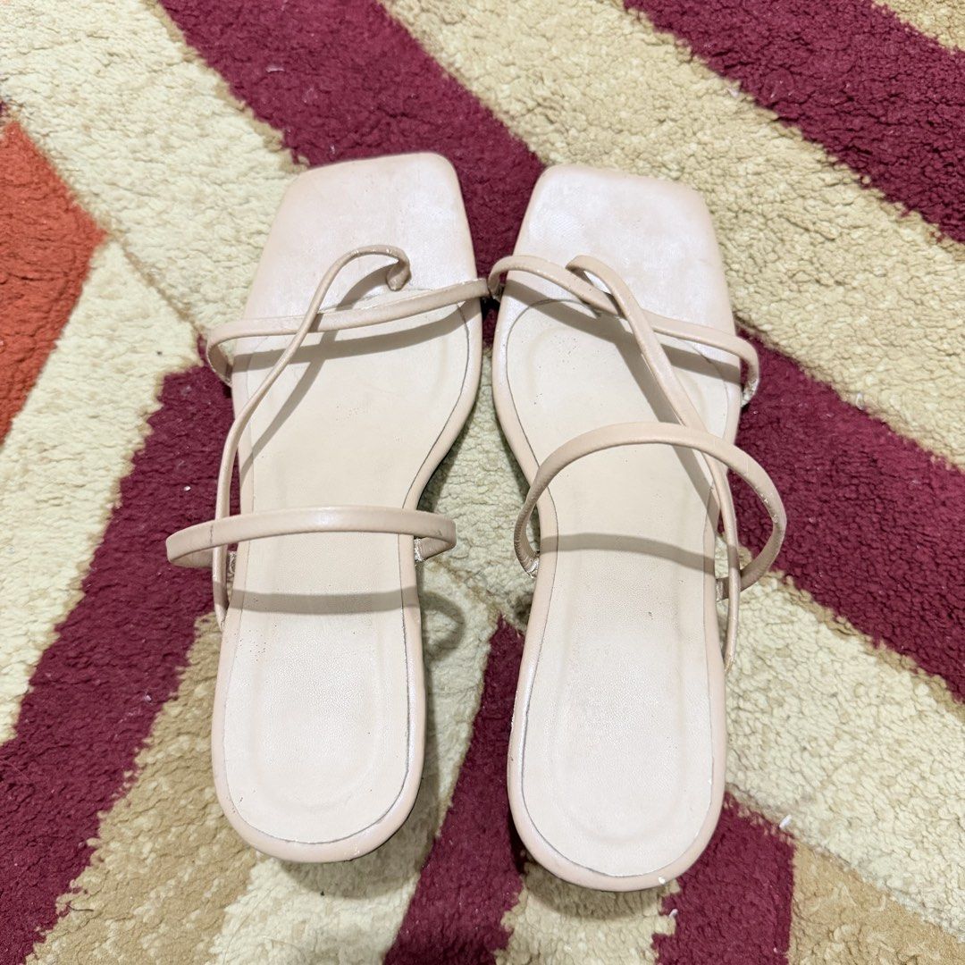 Square Toe Block Heeled Sandals (Nude/Beige) (Category: Heels) located in Manila. Submitted by declutternclutter (Listing ID 1421464142, Image 2). Description: Nude / Beige square-toe sandals - Block heels - Approx. 2-inch heel Women’s size US 7 (23.5 cm feet) First pic is the actual color. It’s the bg that makes it look lighter in the photos. Please see flaws in the photos this is why im selling it at a very low price na but it’s still serves it