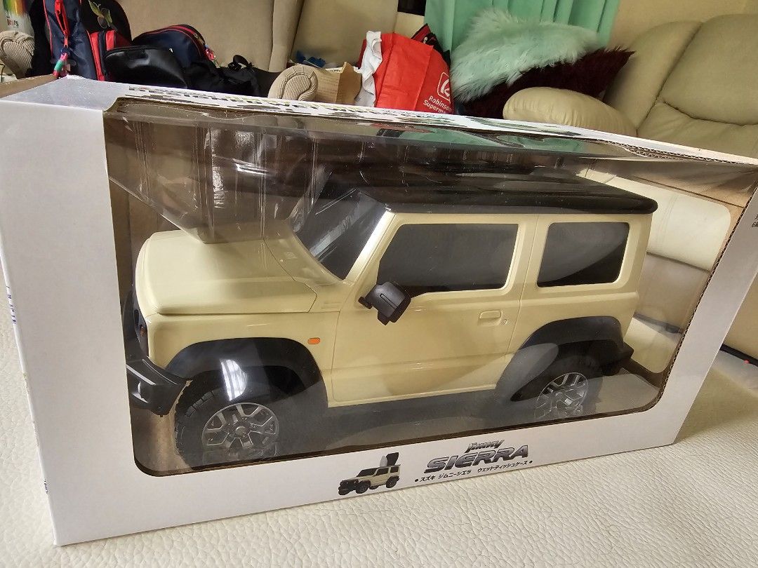 Suzuki Jimny Sierra Tissue Box (Category: Storage Boxes & Baskets) located in Manila. Submitted by brightdolphin_229516 (Listing ID 1421567736, Image 2). Description: - Suzuki Jimny Sierra tissue box - 1:12 scale model - Features a black roof and beige body - Brand new, in original packaging - Can be used as a wet tissue case.