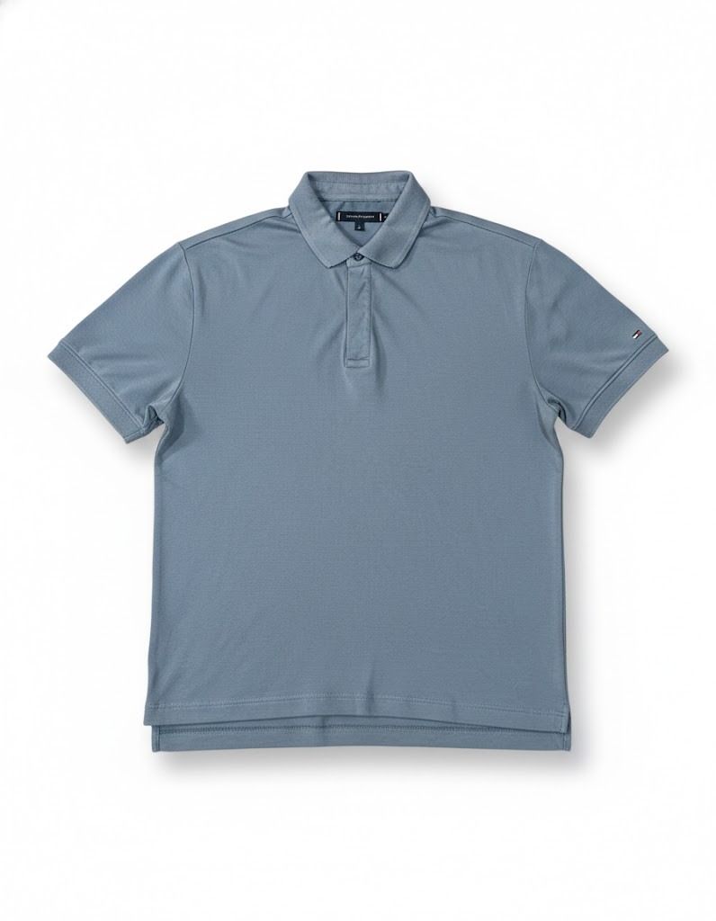Tommy Hilfiger Polo Shirt (Category: Tshirts & Polo Shirts ) located in Manila. Submitted by fromsiah (Listing ID 1421564194, Image 1). Description: Pre-owned Tommy Hilfiger Blue Grayish Polo Shirt SIZE: Medium on tag DIMENSIONS: Width - 22.5in Length - 26.5in CONDITION: 8.5/10 ISSUE: Signs of usage, loose stitch on tag, altered Color may vary due to lighting.