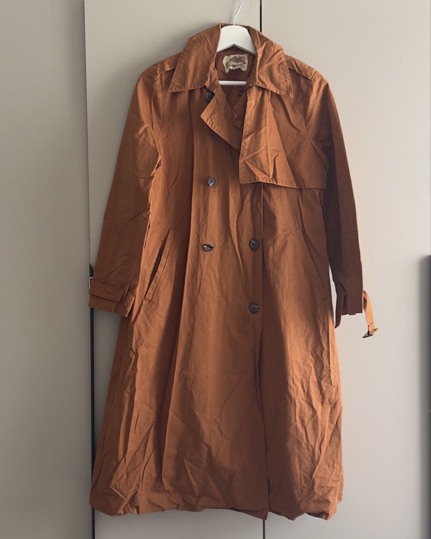 Trenchcoat (Category: Coats, Jackets and Outerwear) located in Makati City. Submitted by clothique.ph (Listing ID 1421458516, Image 3). Description: Trenchcoat Tangerine in color Fits Small-Medium .