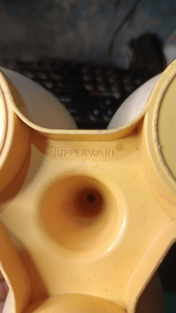 90s Tupperware Spice Rack with Handle 3 in 1 ng (Category: Food Organization & Storage) located in Caloocan City. Submitted by toywarsph (Listing ID 1421454910, Image 3). Description: - Vintage Tupperware spice rack - Three compartments - Yellow lids and bases - Sunburst pattern on lid - Includes a handle - Features Tupperware logo and model numbers - Ideal for spices or small items see last image for minor damage sa takip payment via gcash ship 
