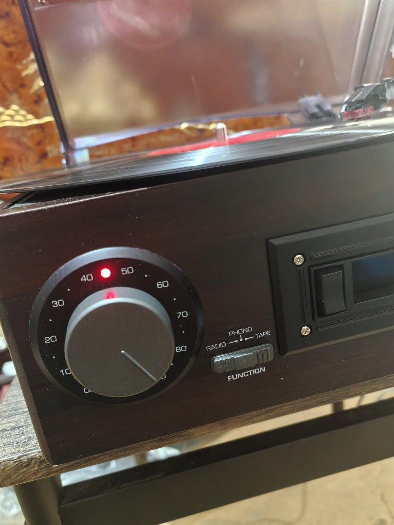 Turntable - Sansui SAN1668 or TT-1668 (Category: Portable Music Players) located in Cebu City. Submitted by dudes_villanueva (Listing ID 1421460867, Image 2). Description: Turntable - Sansui SAN1668 or TT-1668 Brand New with Box 100V 50/60Hz 200 Watts Step-Up Transformer included (Ready to Use) 📌4-in-1 turntable vintage-style home audio system featuring a wood finish. Key features of this collectable turntable. 📌A turntable for playing vinyl re