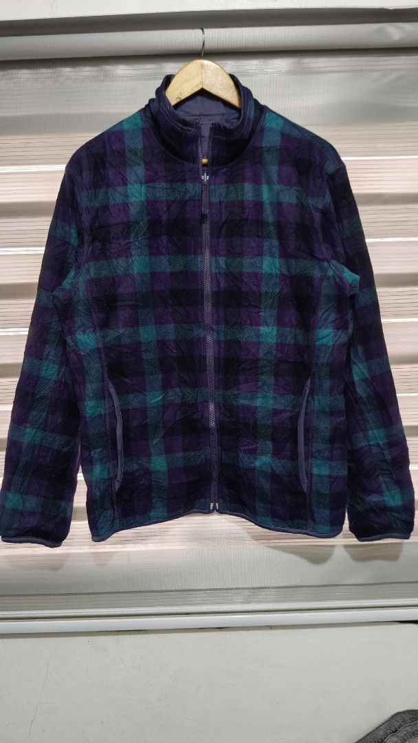 Uniqlo Reversible Fleece Jacket - Size L (Category: Coats, Jackets and Outerwear) located in Cavite. Submitted by trend27 (Listing ID 1421525585, Image 2). Description: - Uniqlo Reversible Jacket - Size: L - Features: - Solid navy side - Purple and teal plaid fleece side - Full zip closure - Two pockets on the fleece side Dimension 21/27.