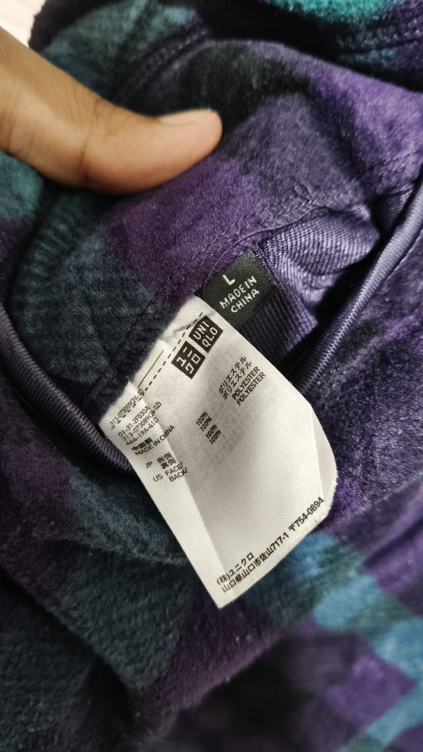 Uniqlo Reversible Fleece Jacket - Size L (Category: Coats, Jackets and Outerwear) located in Cavite. Submitted by trend27 (Listing ID 1421525585, Image 3). Description: - Uniqlo Reversible Jacket - Size: L - Features: - Solid navy side - Purple and teal plaid fleece side - Full zip closure - Two pockets on the fleece side Dimension 21/27.