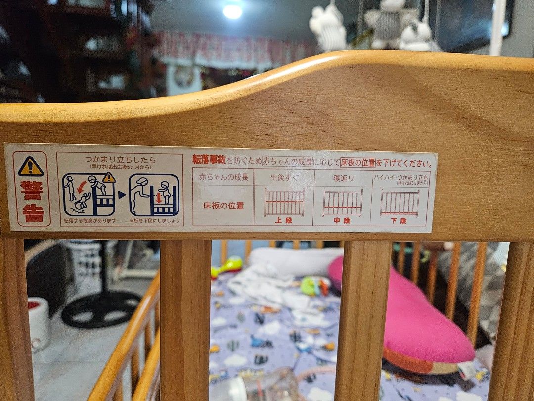 Wooden Baby Crib (Category: Cots & Cribs) located in Manila. Submitted by bigfish1990 (Listing ID 1421611929, Image 3). Description: Not the typical Baby Crib size. Bigger than the usual Crib here in PH Japan Baby Crib with storage. Bought it 16,000 without foam. Dimensions: Width 48 x Depth 31 x 44 Height Inclusions: Accessories Foam with 3 beddings Some baby Toys - Wooden baby crib with a natural finish. - Slatted design for ventilation and vis