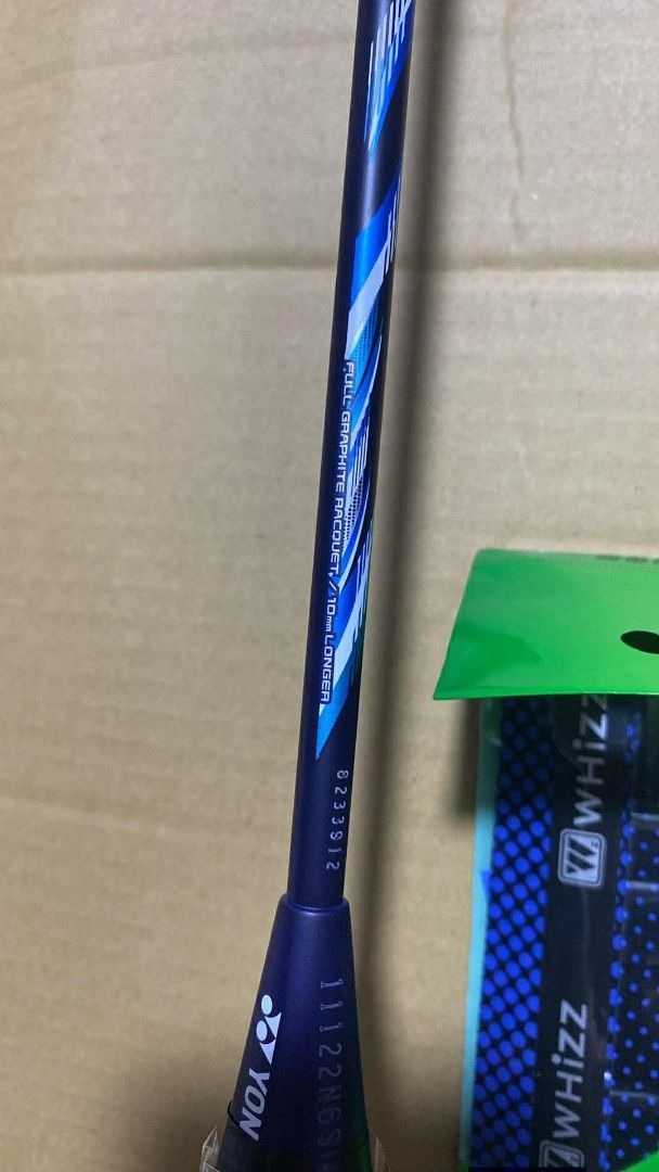 Yonex Badminton Racket (Category: Racket and Ball Sports) located in Taguig. Submitted by jerafelsan87737 (Listing ID 1421550883, Image 2). Description: - Brand new Yonex ROX LITE 271 badminton racket. - Comes with a grip. - Still in its original packaging. - Features a stylish blue and white design..