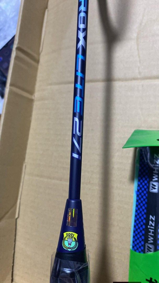 Yonex Badminton Racket (Category: Racket and Ball Sports) located in Taguig. Submitted by jerafelsan87737 (Listing ID 1421550883, Image 3). Description: - Brand new Yonex ROX LITE 271 badminton racket. - Comes with a grip. - Still in its original packaging. - Features a stylish blue and white design..