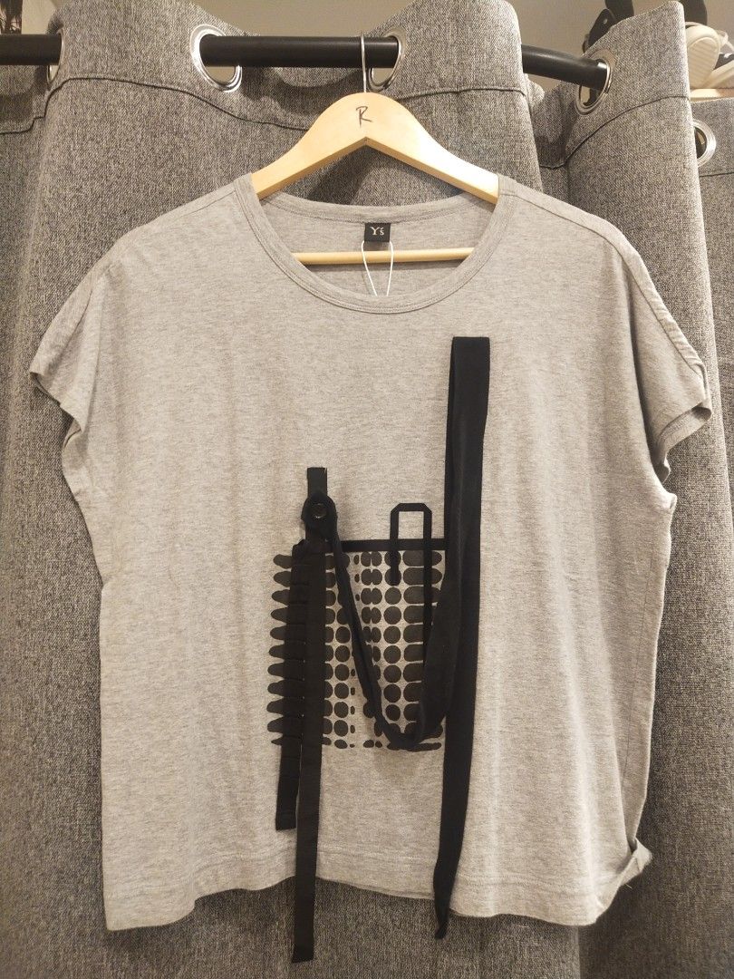 Y's Graphic Print T-shirt (Category: Tshirts & Polo Shirts ) located in Quezon City. Submitted by markythegrappler17 (Listing ID 1421568388, Image 1). Description: - Y's T-shirt - Unique graphic print - Size 2 Oversize - Gray color - Black accents - Crew neck - Short sleeves - Soft, comfortable fabric.